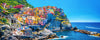 Colourful cliffside houses of Manarola in Cinque Terre, Italy, overlooking a turquoise harbour and the Mediterranean sea