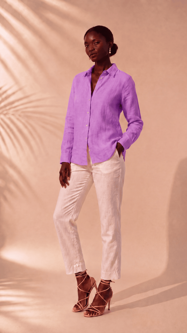 PP Linen Blouse in Orchid Belgian linen, side view showing curved hem and long sleeves.
