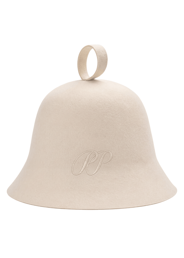 Luxury sauna hat in Ivory colour made of 100% certified natural wool felt with tonal PP monogram, handmade at the PP atelier by Pieter Petros