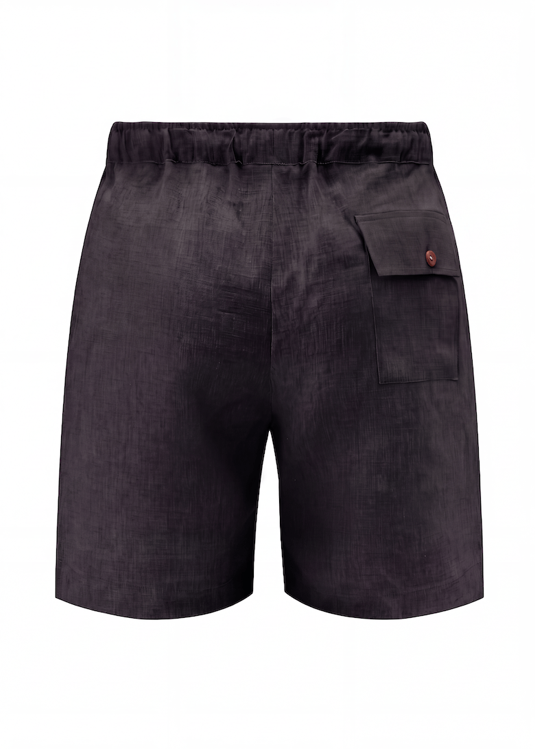 Back view of Black Pieter Petros tennis shorts in 100% Belgian linen with walnut button pocket, handmade in Dubai